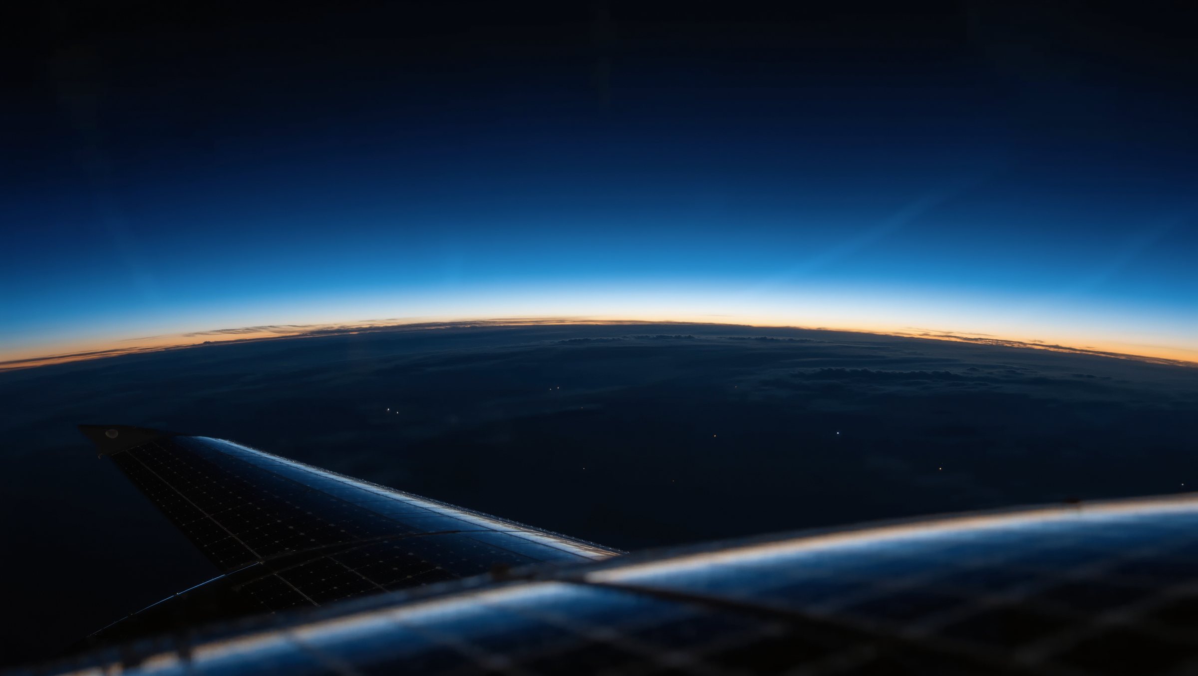 Sunrise over the curve of Earth seen from orbit